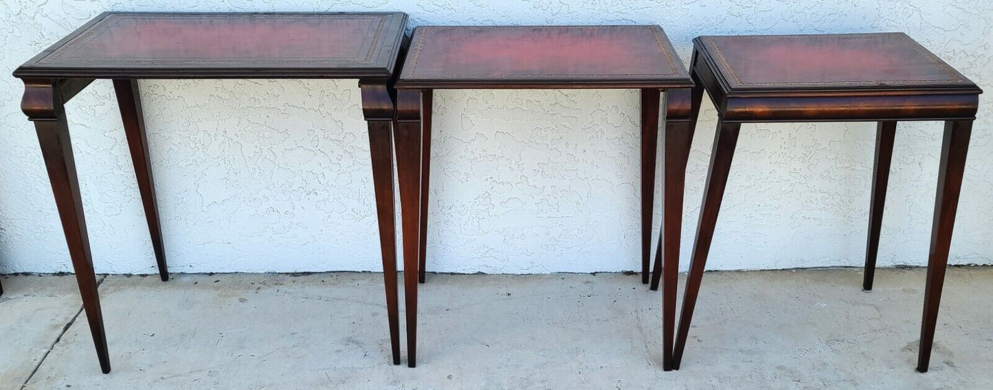 Mid Century Tooled Red Leather Mahogany Nesting Tables