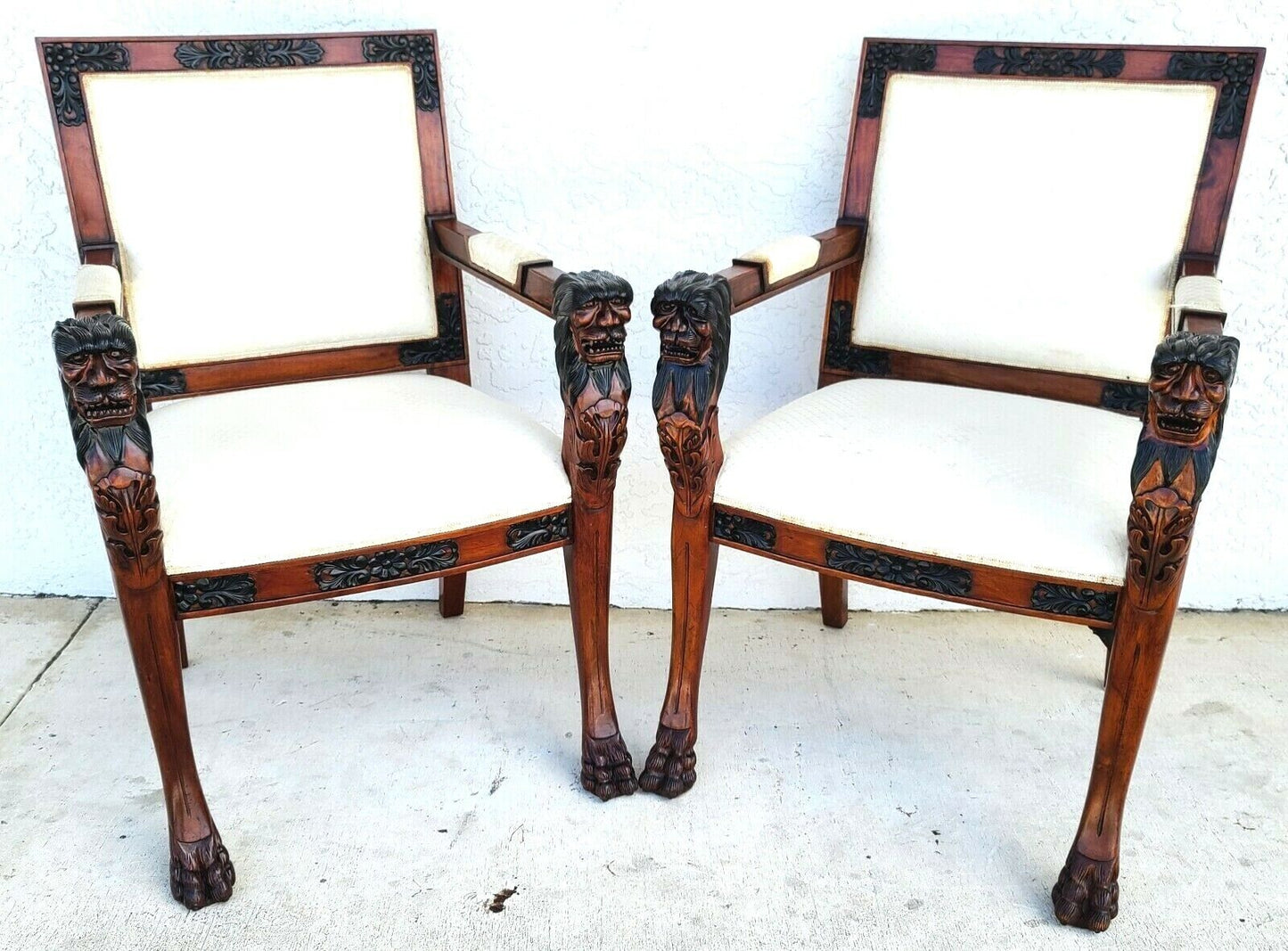 Pair of Hand Carved Mahogany Lions Head Armchairs