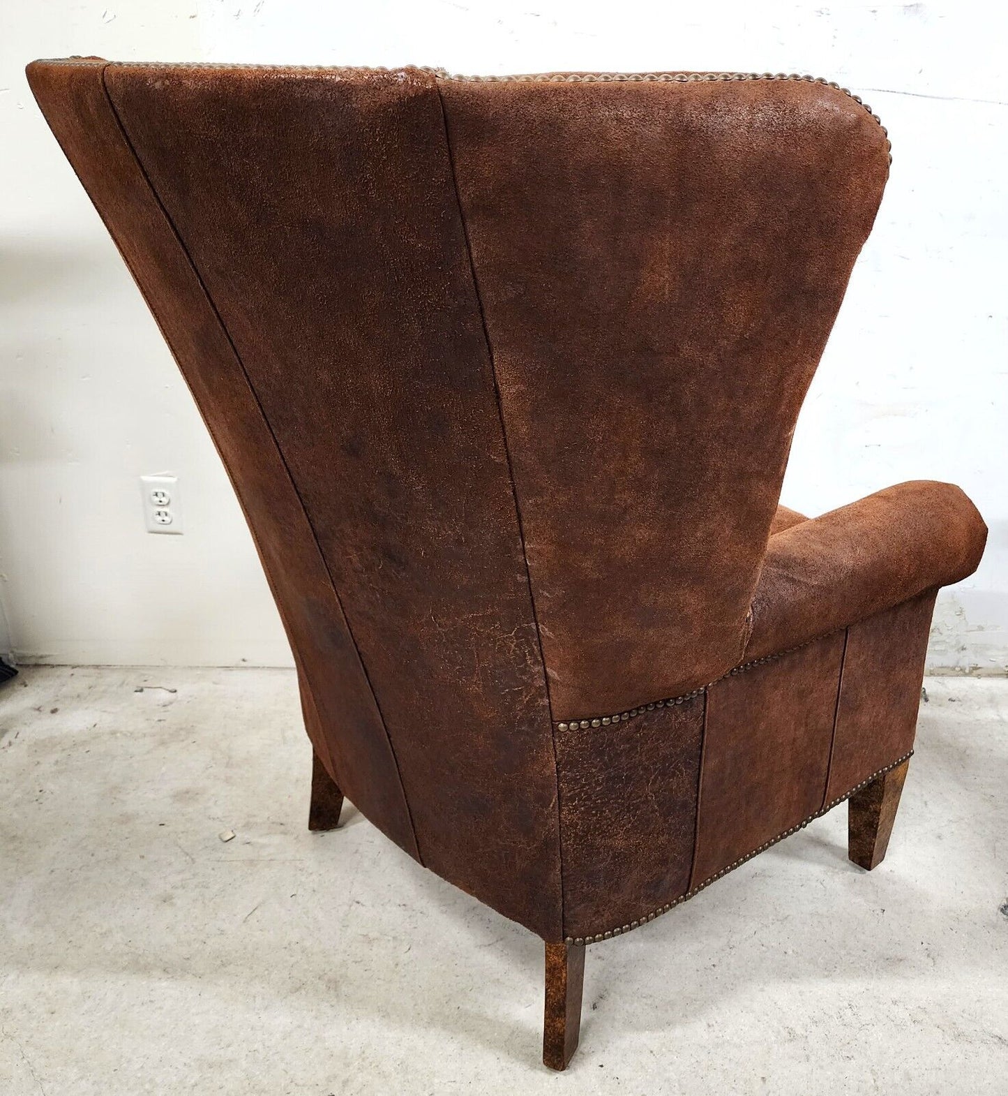 Leather Wingback Lounge Chair by PAUL ROBERT