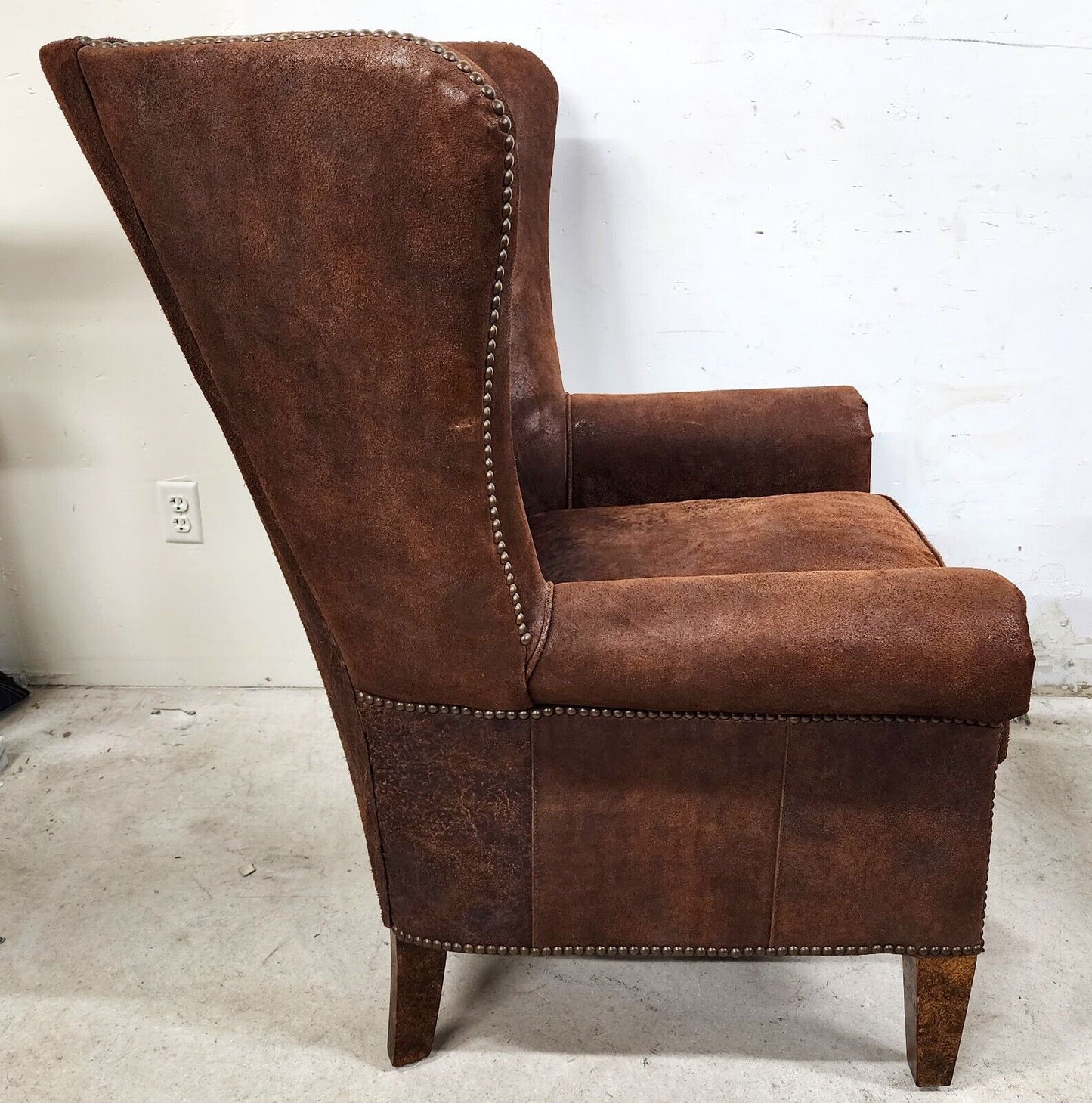 Leather Wingback Lounge Chair by PAUL ROBERT