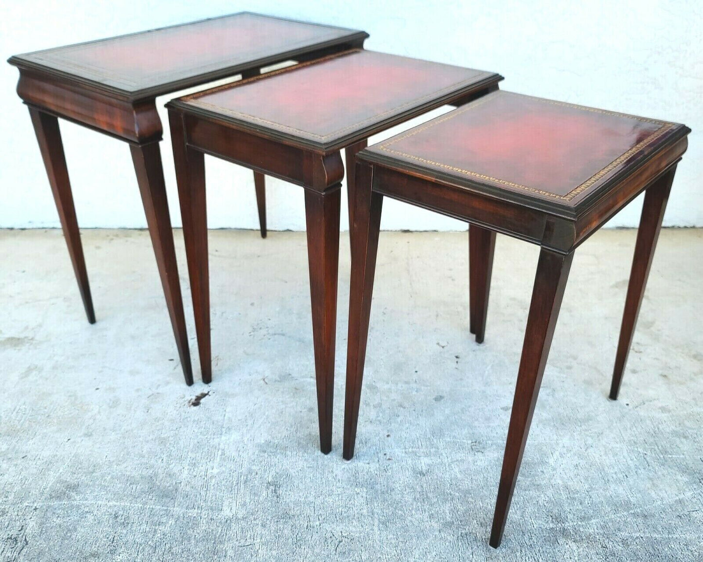 Mid Century Tooled Red Leather Mahogany Nesting Tables