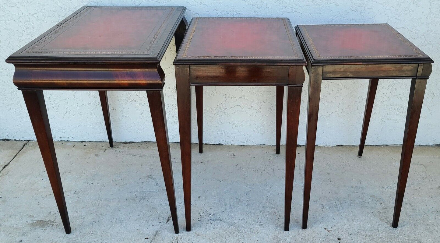 Mid Century Tooled Red Leather Mahogany Nesting Tables