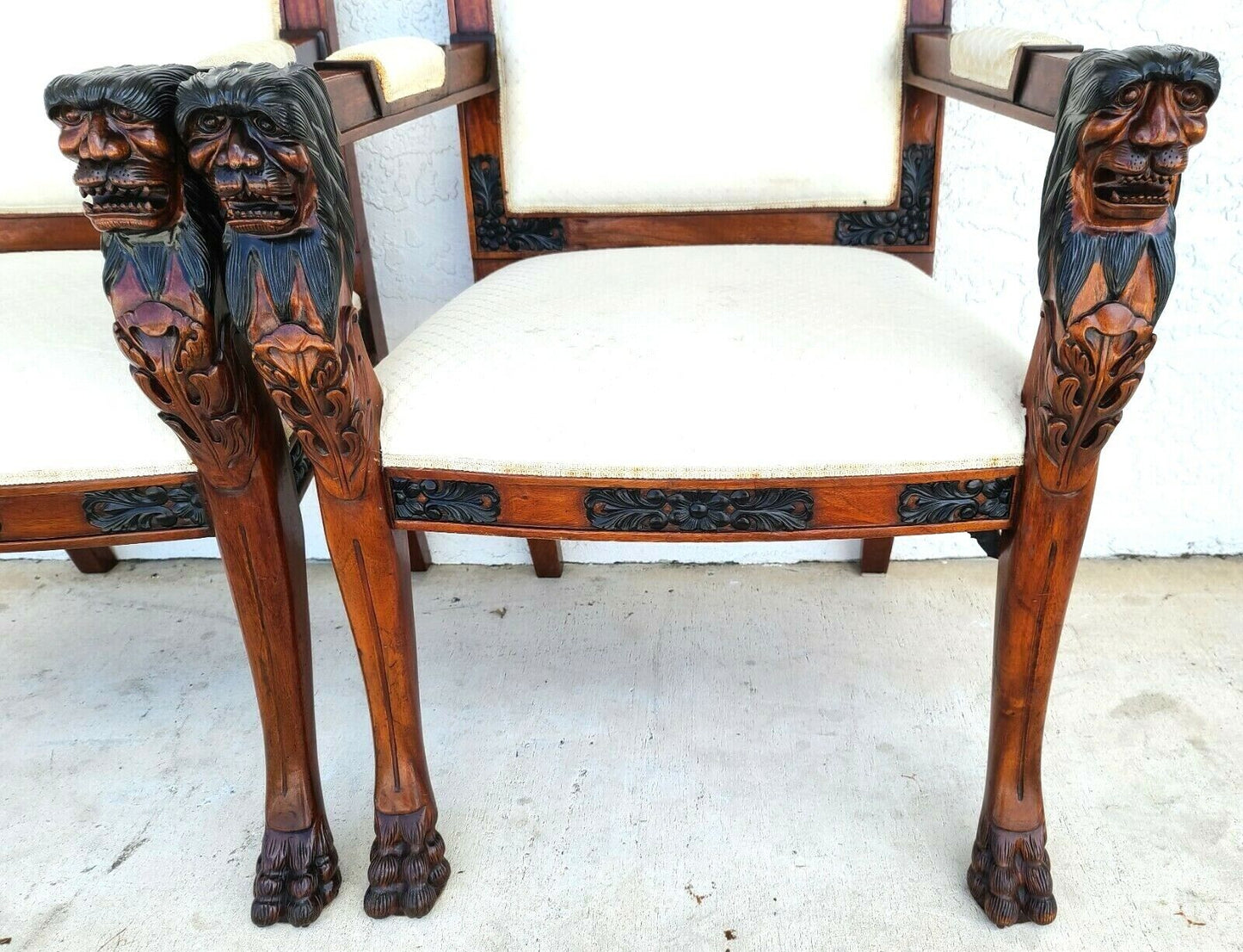 Pair of Hand Carved Mahogany Lions Head Armchairs