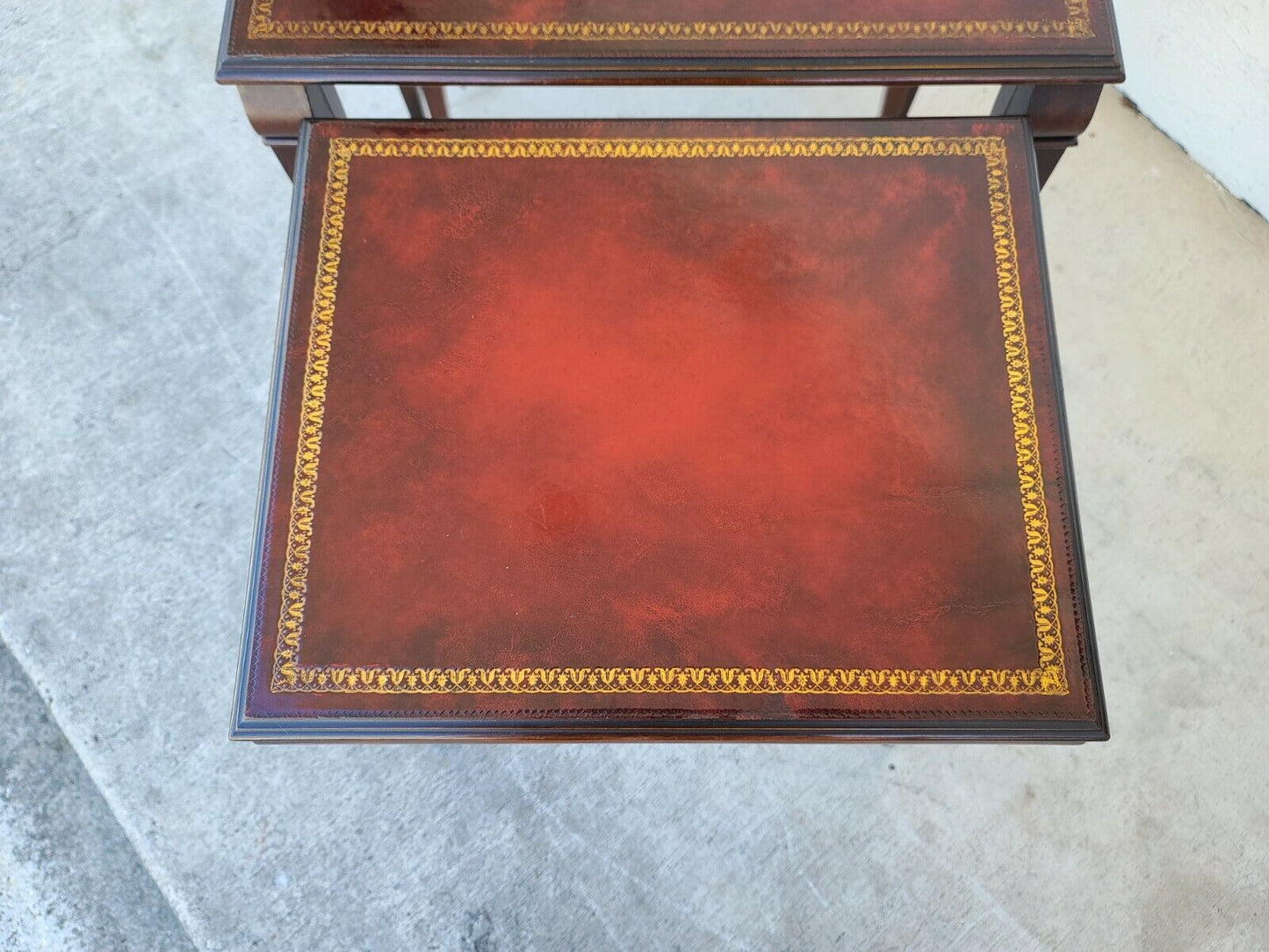 Mid Century Tooled Red Leather Mahogany Nesting Tables