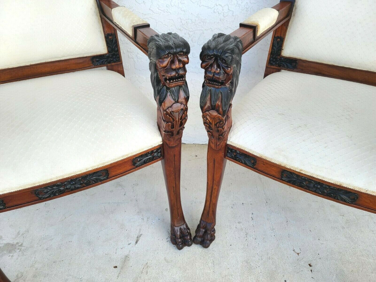 Pair of Hand Carved Mahogany Lions Head Armchairs