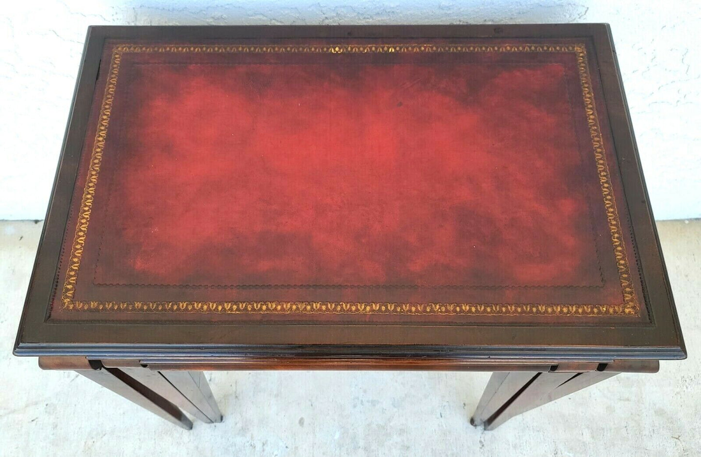 Mid Century Tooled Red Leather Mahogany Nesting Tables