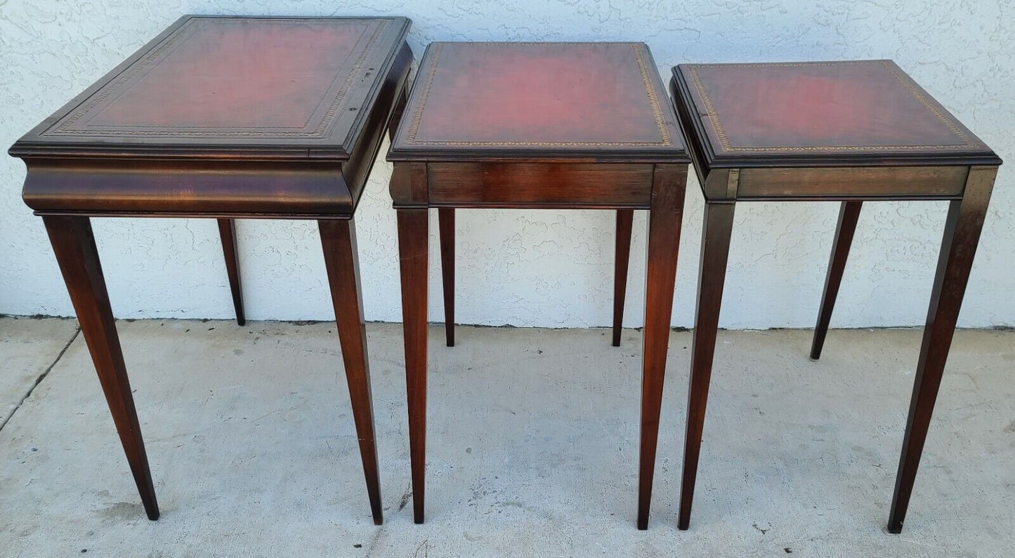 Mid Century Tooled Red Leather Mahogany Nesting Tables