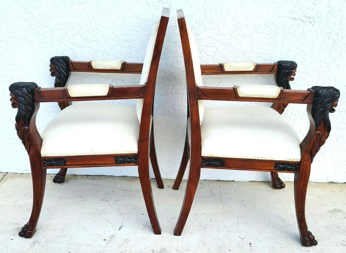 Pair of Hand Carved Mahogany Lions Head Armchairs